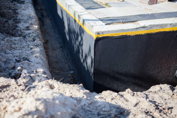 Professional Emergency Waterproofing technician working in Hollansburg, OH